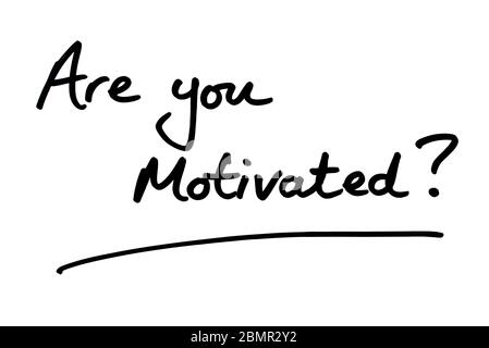 Are you Motivated? handwritten on a white background. Stock Photo