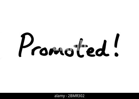 Promoted! handwritten on a white background. Stock Photo