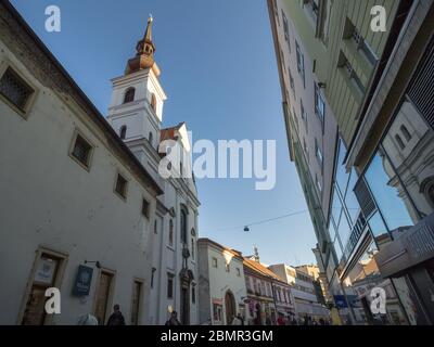 BRNO, CZECHIA - NOVEMBER 4, 2019: Kostel svate mari magdaleny, also called saint mary magdalene church in a Medieval pedestrian narrow street of Brno, Stock Photo
