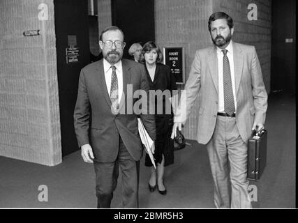 Wall Street securities analyst Joseph Pikul, left, with his lawyer, Ronald J. Bekoff at the Orange County Courthouse where is tried for the murder of his second wife, Diane Whitmore, at the Goshen, NY on January 15, 1989. Pikul’s third wife, Mary Bain, is shown in the background. Photo by Francis Specker Stock Photo