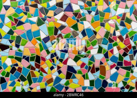 Pattern texture of colorful small mosaic tiles on the wall. Stock Photo