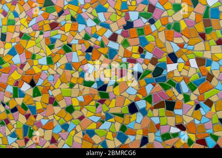 Pattern texture of colorful small mosaic tiles on the wall. Stock Photo