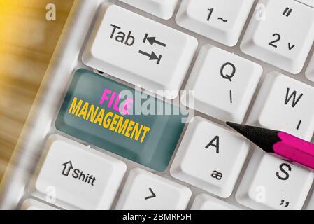 Handwriting text writing File Management. Conceptual photo computer program that provides user interface to manage data Stock Photo