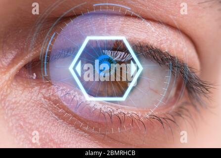 The concept of sensor implanted into human eye Stock Photo