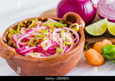 habanero sauce with onion and lemon, traditional for Cochinita Pibil from Merida Yucatan Mexico Stock Photo