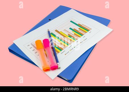 pencil, Blue file, graph sheet, Color highlight pen on pink background isolated, concept Office equipment Stock Photo