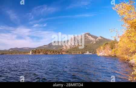 Majestic nature of Kazakhstan concept: epic view of Burabay lake with Okzhetpes and Zhumbaktas rocks at sunrise in autumn season Stock Photo