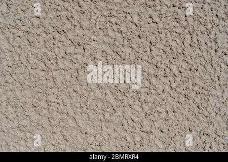 Texture of sea sand on a tropical beach after the rain, top view Stock Photo