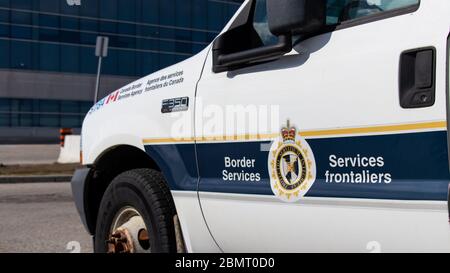 Canada Border Services Agency logo on the side of a patrol car at Toronto Pearson Airport. Stock Photo