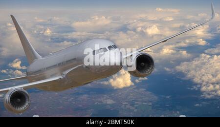 Vision of an Airbus passenger plane during flight over beautiful clouds Stock Photo