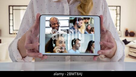 People working and having video call on laptop Stock Photo