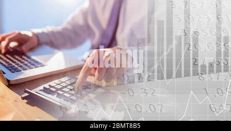 Caucasian male hands calculating over statistics Stock Photo