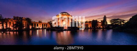 Panoramic view of the Palace of Fine Arts illuminated after Sunset in San Francisco, California Stock Photo
