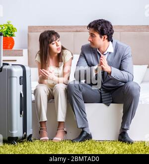 The wife seeing her husband off to business trip Stock Photo