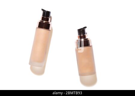 Container bottles for foundation or bb and cc cream.  Transparent glass bottle with dispenser. Template of packaging for cosmetic product Stock Photo