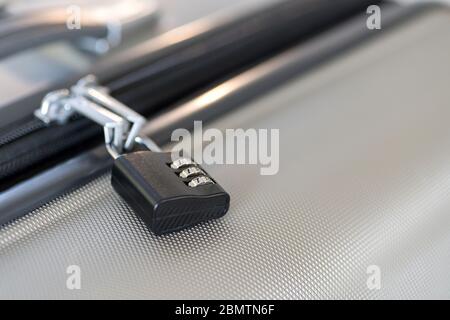 small Luggage lock, magnetic closure combinations, safety on the road, macro close-up Stock Photo