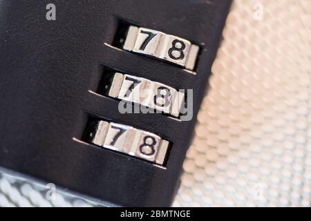 small Luggage lock, magnetic closure combinations, safety on the road, macro close-up Stock Photo