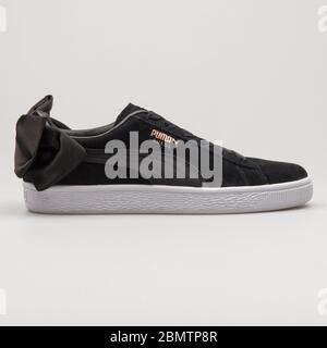 VIENNA AUSTRIA FEBRUARY 19 2018 Puma Suede Bow black sneaker on white background Stock Photo Alamy