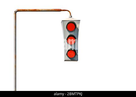 Isolated Vintage old traffic light on a rusty post. All lights are red. The concept of prohibition and bad luck. Stock Photo