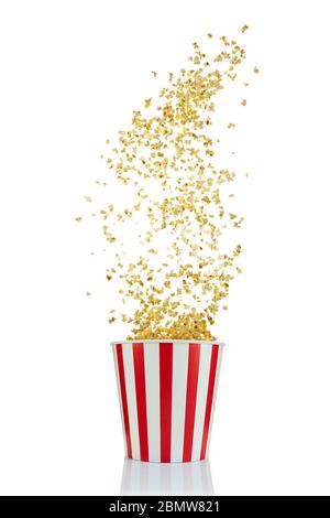 Flying popcorn from red and white paper striped bucket isolated over the white background. Cinema style popcorn Stock Photo