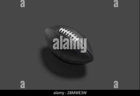 Blank black american soccer ball mockup, dark background Stock Photo