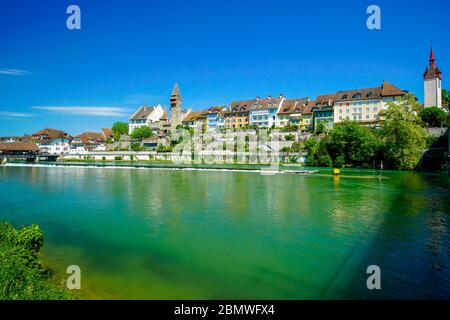 Panoramic view of the covered wooden bridge over Reuss river in Old Town Bremgarten, Aargau Canton, Switzerland. Stock Photo
