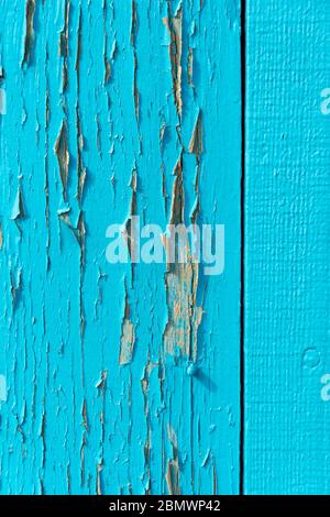 Peeling blue paint on wood, close up. Stock Photo