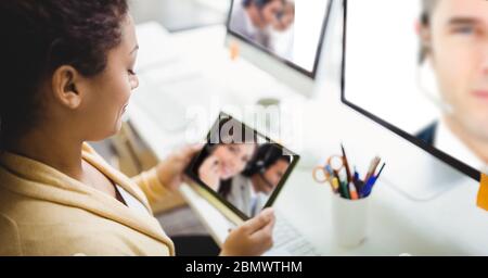 Woman having video call on digital tablet Stock Photo