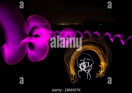 Creating images with light painting or light drawing Stock Photo