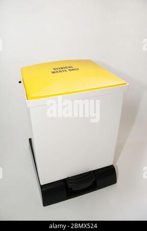 Clinical waste only bin for waste in a hospital environment. Designed for hazardous medical rubbish or garbage only. Plain studio background, ideal fo Stock Photo