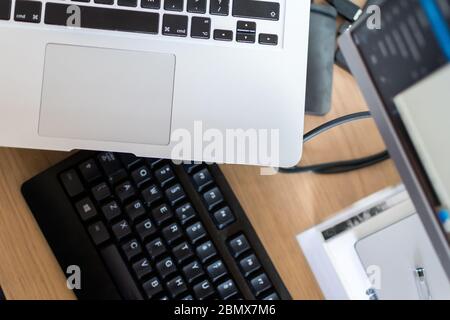 Multitasking whilst working from home. Stock Photo