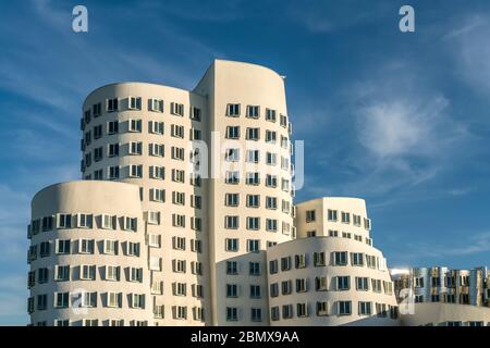 Der Neue Zollhof mit den Gehry-Bauten des Architekten und Designer Frank Gehry im MedienHafen, Landeshauptstadt Duesseldorf, Nordrhein-Westfalen, Deut Stock Photo