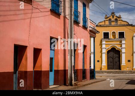 Street with well preserved colonial architecture in the town of Remedios, Cuba Stock Photo