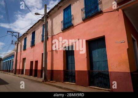 Street with well preserved colonial architecture in the town of Remedios, Cuba Stock Photo