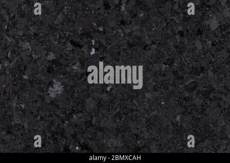 Black granite tile texture, background from natural stone. Stock Photo