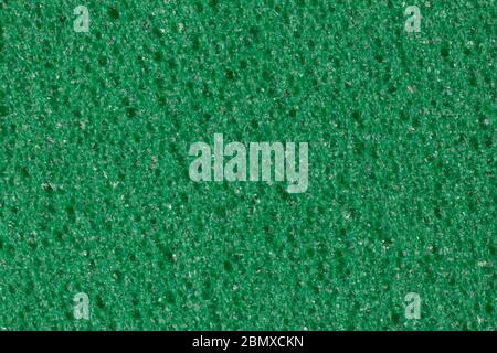 Calm green foam EVA texture with contrast porous surface. Stock Photo