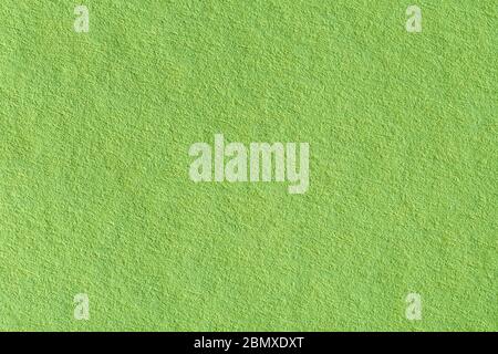 Green, lime paper texture close-up. Can be used as background in art projects. Stock Photo