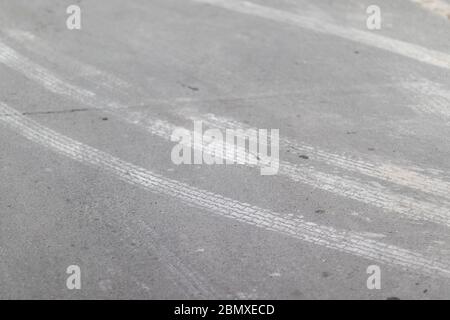 Abstract background wheel tracks on the road covered with hoarfrost Stock Photo