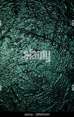 old textured green wall texture background for inscriptions Stock Photo