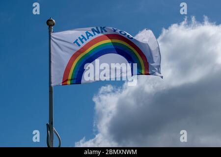 Littlehampton, West Sussex, UK, May 11, 2020, Thank You flag for the NHS and Care Workers fluttering in the breeze on a sunny spring day in England. Stock Photo