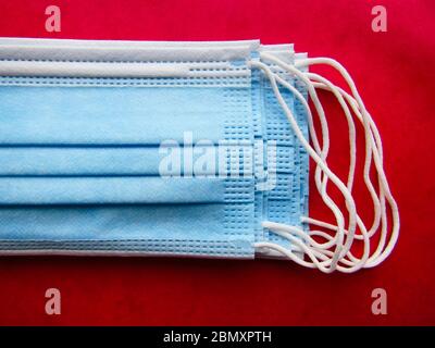 A Pile of Blue Protective Face Masks Stock Photo
