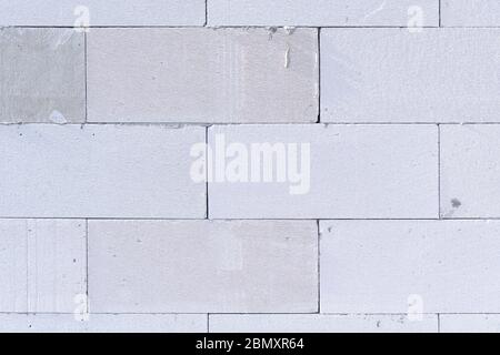 background texture of white Lightweight Concrete block, raw material for industrial wall Stock Photo
