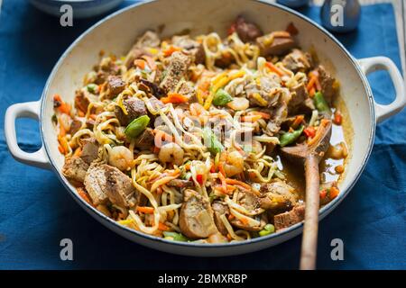 Singapore noodles - stir-fry of pork and prawns, flavoured with teriyaki & madras Stock Photo