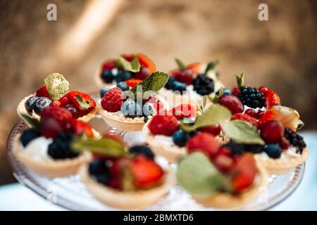 photo of small berries tartelette in a plate Stock Photo