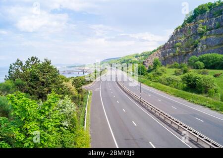 A55 North Wales Expressway empty with no traffic from rainbow bridge empty road concept no travel deserted ban stay indoors essential travel only Stock Photo