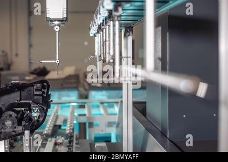 Close up of 3D dimension measurement plastic parts by CMM, 3D automatic measuring system Stock Photo