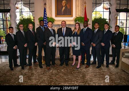 Secretary Pompeo Meets With Staff and Families of U.S. Embassy Lima U.S. Secretary of State Michael R. Pompeo poses for a photograph with Marine Security Guards while meeting with staff and families of U.S. Embassy Lima, in Lima, Peru, April 13, 2019. Stock Photo