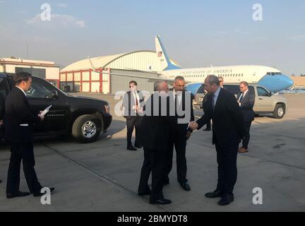 Acting Secretary Sullivan Departs Peru Acting Secretary of State John Sullivan bids farewell to U.S. Ambassador to Peru Krishna R. Urs upon departure from Lima, Peru on April 14, 2018. Stock Photo