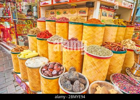 DUBAI, UAE - MARCH 2, 2020: The store of Deira Grand Souq (market) with wide range of spices, herbs, dried fruits, nuts and flower tea, on March 2 in Stock Photo