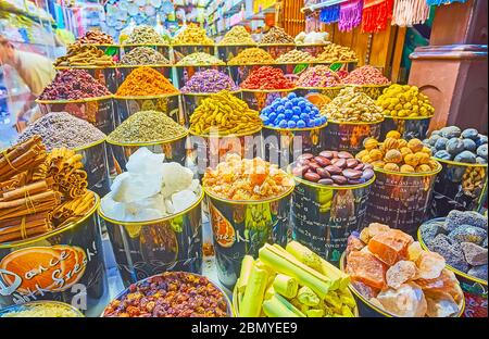 DUBAI, UAE - MARCH 2, 2020: The large amount of spices, herbs, flower tea, nuts, rock salt and minerals for skin and body care in Grand Souq, Deira, o Stock Photo